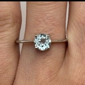 Elegant Silver Ring with Light Blue Gemstone